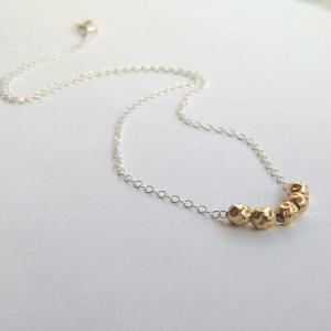 silver necklace, gold bead necklace..