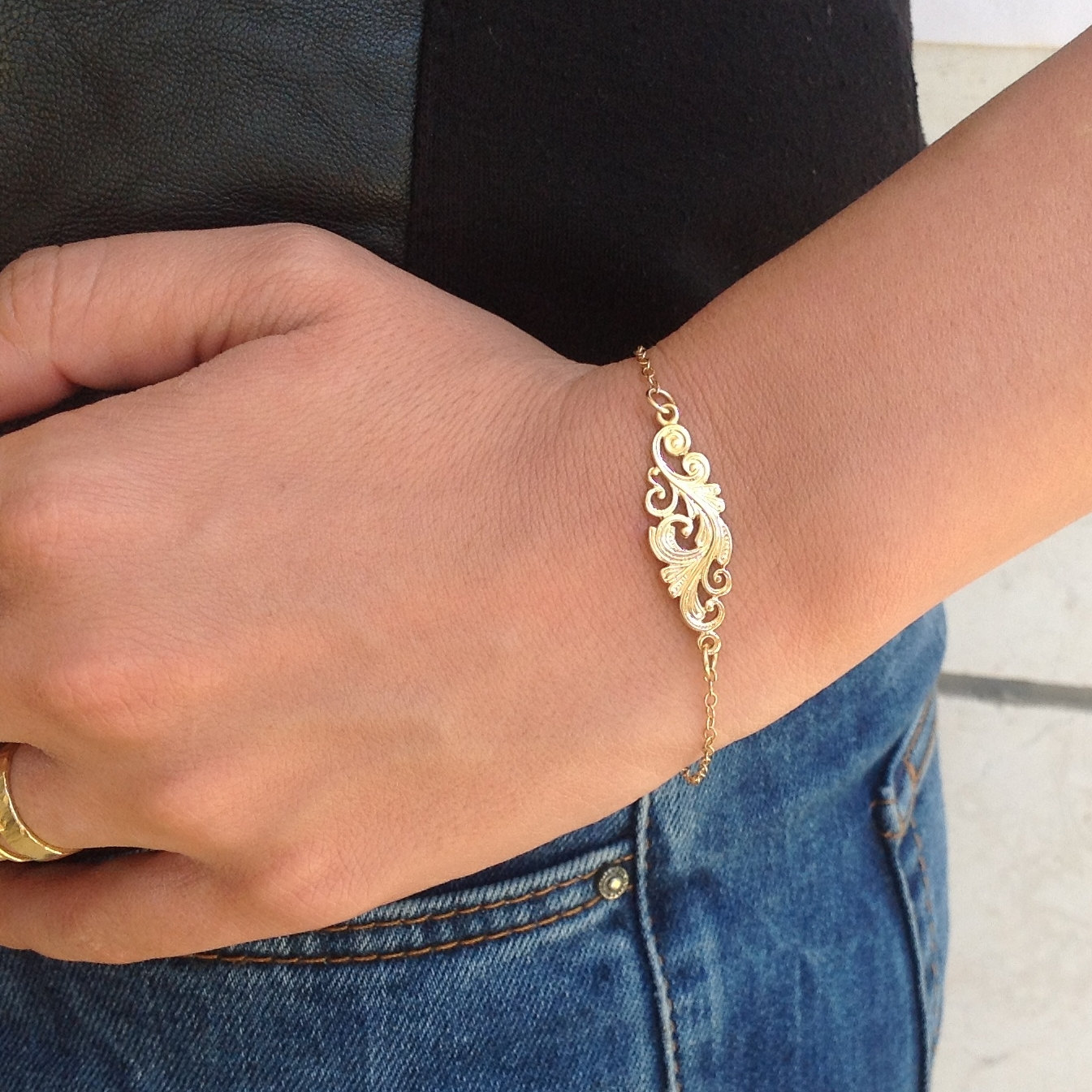 Gold bracelet hand
